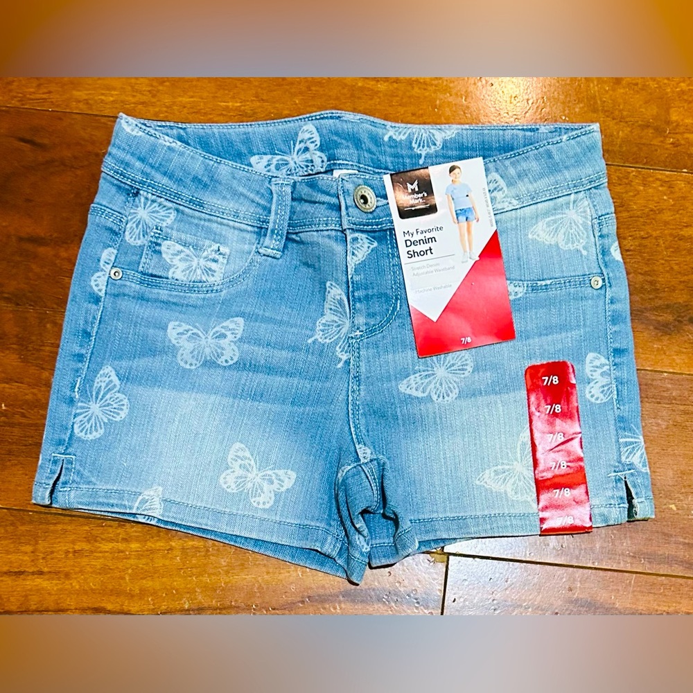 Members Mark girls Jean shorts, butterflies, new with tags, size 7/8, stretchy.